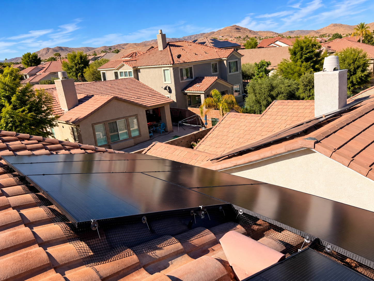 Bird proofing mesh installed around solar panels on tile roof