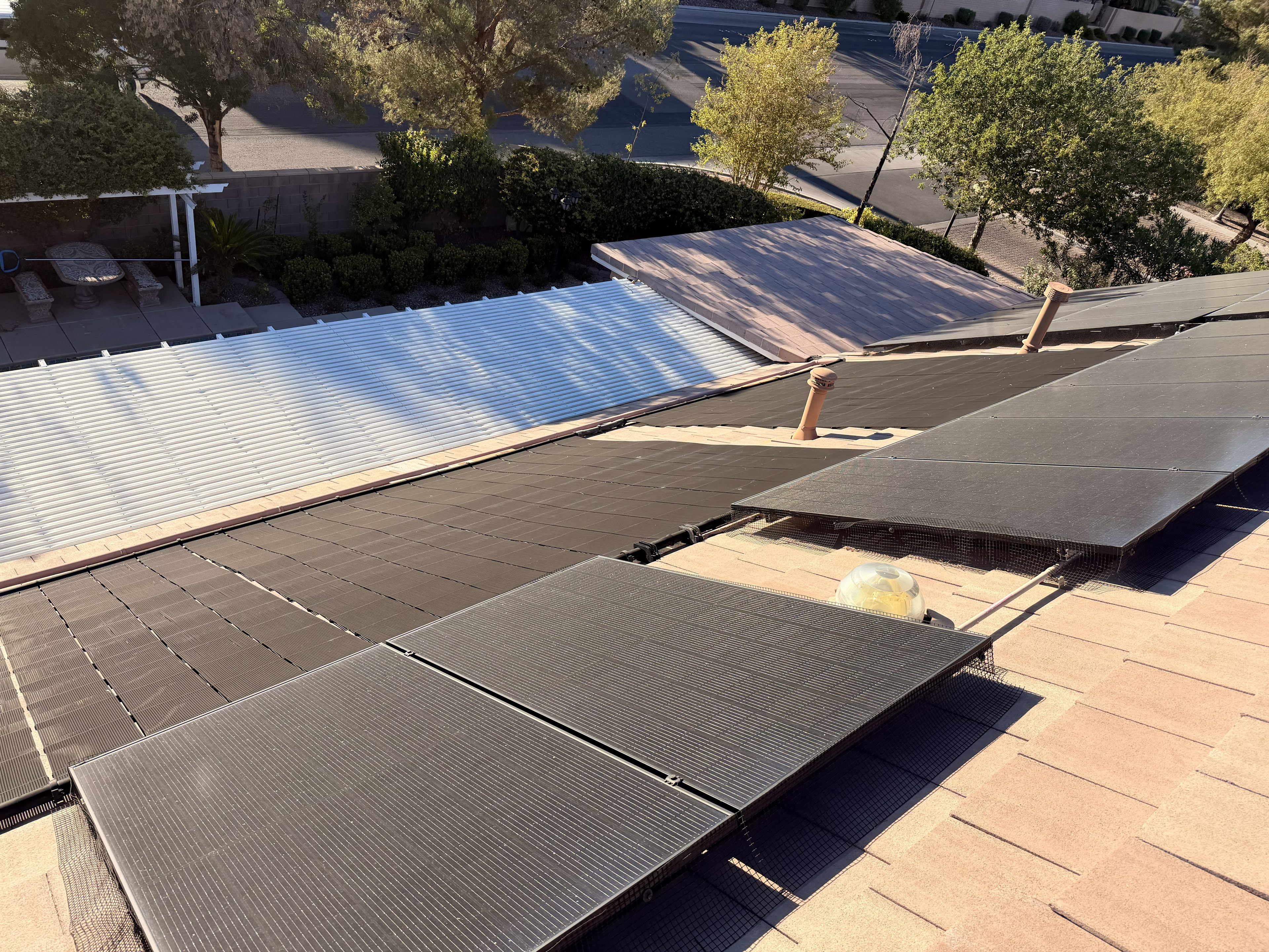 Dirty solar panels covered in dust and debris before cleaning at Lookout Rock